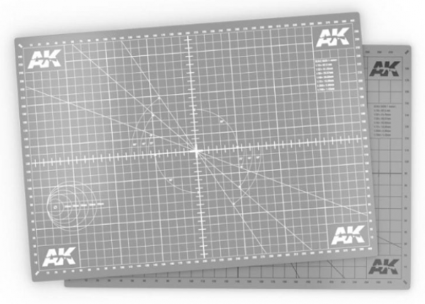 AK Interactive, cutting mat A3 size 450mm x 300mm, neutral color, 2-sided with white markings on one side and black on the other.