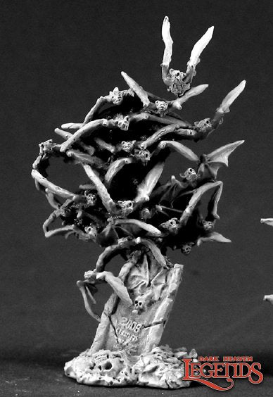 Dark fantasy miniature with skeletal figures on a branch against a dark background, featuring 'Reaper Miniatures' branding. Swarm of bats