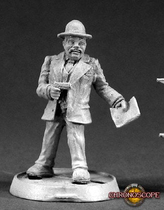 Miniature figure of a man in a suit and hat holding a briefcase and gun on a gray background with 'Chronoscope' branding. Reaper Miniatures. Chang Honolulu investigator unpainted