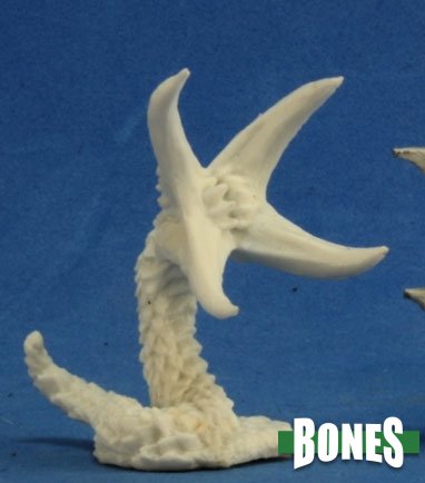 White fantasy creature horn on a blue background with 'BONES' branding. Reaper Miniatures unpainted from the Dark Heaven Bones collection.