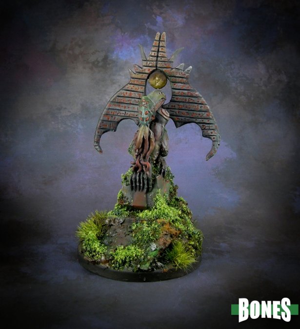 Miniature figurine with detailed design on a dark background, featuring the brand 'BONES'. Reaper Miniature painted Dark Heaven/Bones collection