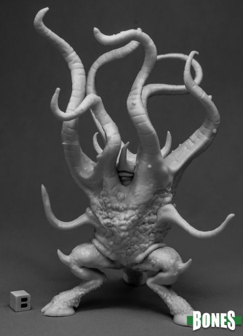 Monster figurine with long tentacles on a dark background, featuring the 'Bones' brand.
