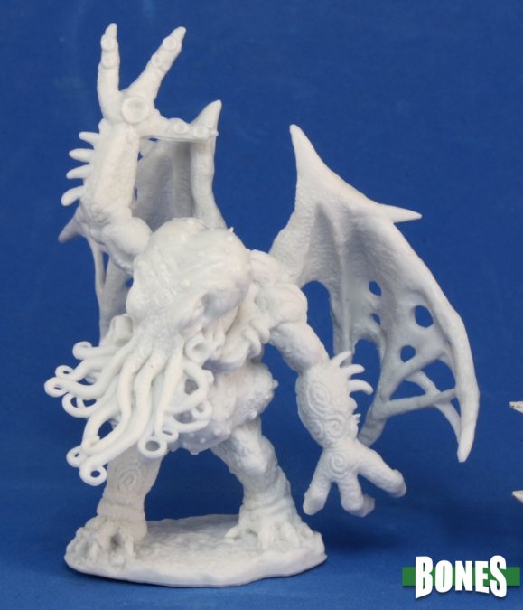 White fantasy demon figurine on a blue background with 'Bones' branding. Eldritch demon from Reaper Miniatures unpainted