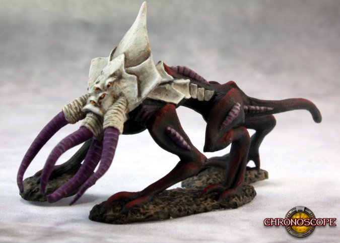 Fantasy creature figurine with long purple tentacles on a gray background. Reper Miniatures Hound of Tindalos