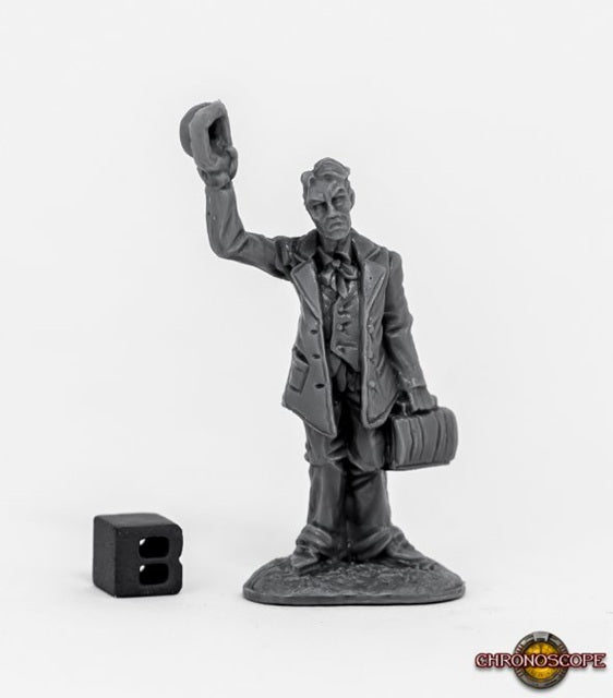 Plastic figurine of a physician in a suit with a hat and medical bag on a white background, with 'Chronoscope' branding. Reaper Miniatures unpainted