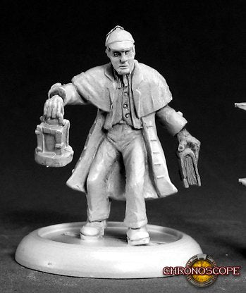 Miniature figure of a character holding a lantern on a black background. Reaper Miniatures Sherlock Holmes unpainted