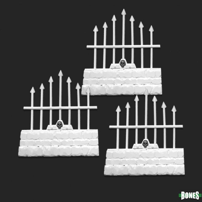 Set of white miniature fences with pointed tops on a black background, featuring the 'BONES' brand. Reaper Miniatures