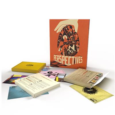 Perspectives Game Box with rules, information sheets, and more spread out infront of it